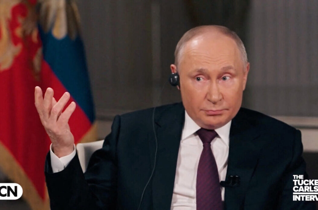 Russian President Vladimir Putin speaks during an interview with U.S. television host Tucker Carlson, in Moscow
