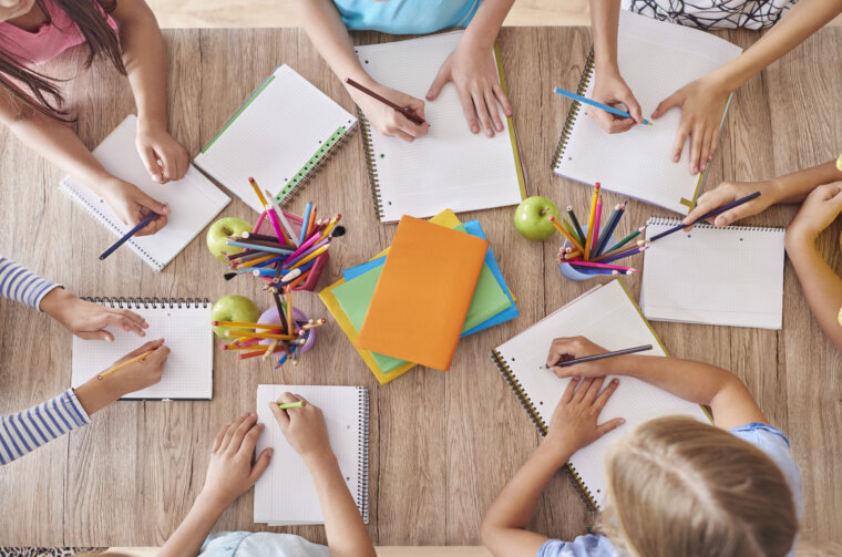 Kids around the school table
