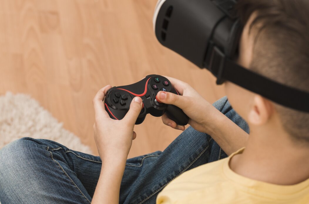 high-angle-boy-playing-video-games-with-virtual-reality-headset high-angle-boy-playing-video-games-with-virtual-reality-headset